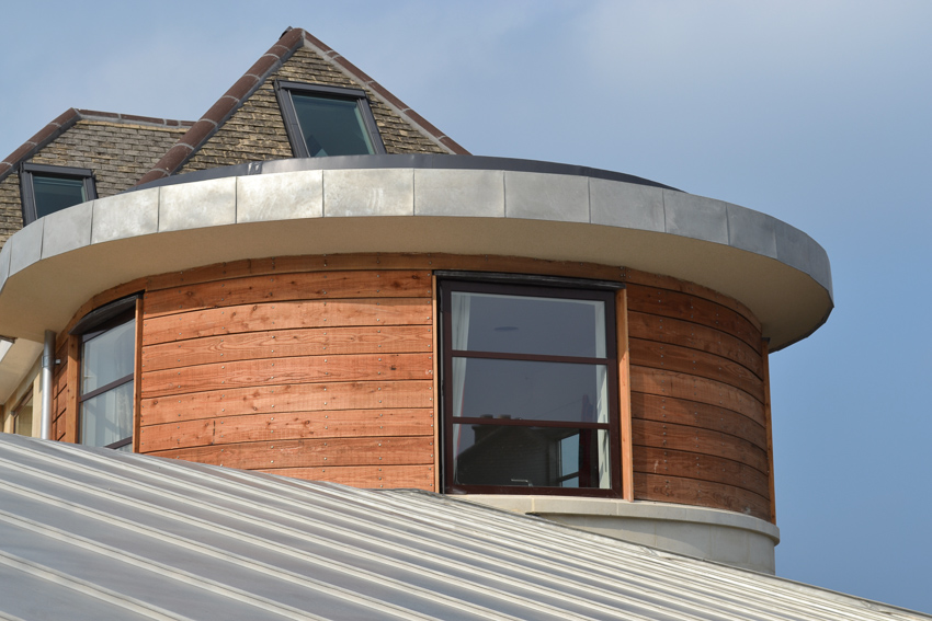 elegant curved bay roof level extension